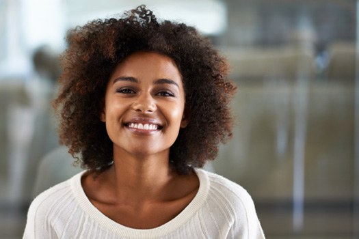 Patient smiling after cosmetic dentistry 